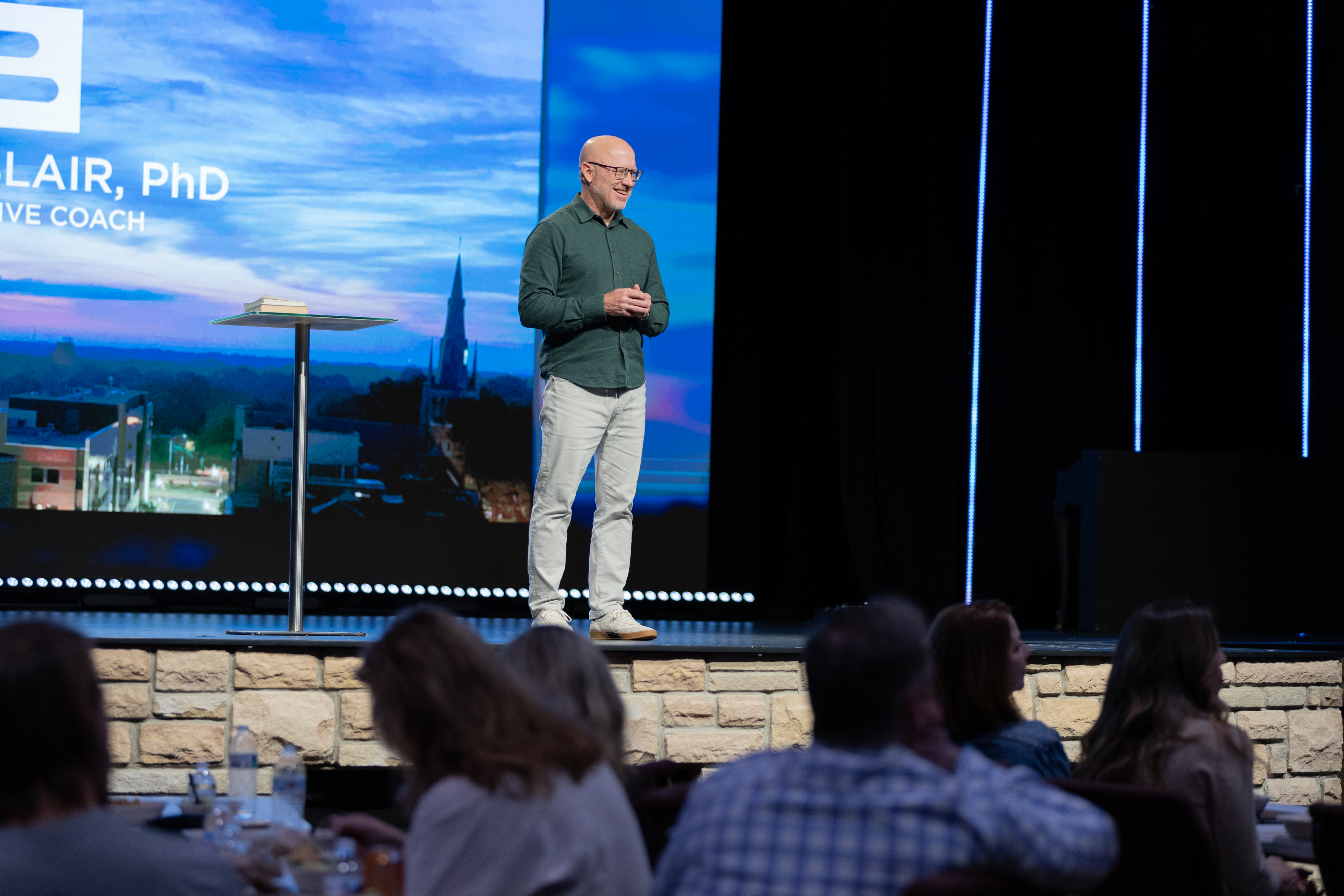 Brett Blair speaking on stage